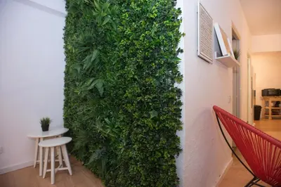 a room with bunk beds and a hallway with paintings at Travel & Live Marques in Porto