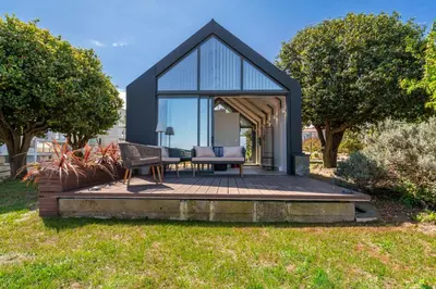 a gazebo with a table and chairs in a yard at FONTE SANTA Manor House in Vila Nova de Gaia