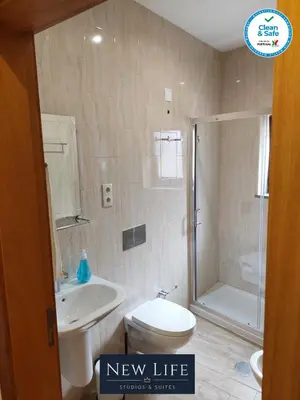 a new life bathroom with a toilet and a shower at New Life - IGREJA SÃO FRANCISCO STUDIO-2T in Porto