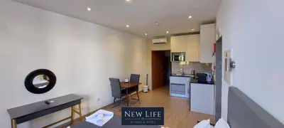 a kitchen with a new life sign in a room at New Life - FUNDAÇÃO SERRALVES STUDIO-0F in Porto