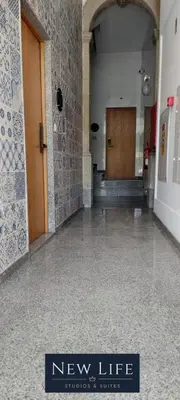 a hallway with a new life sign in a building at New Life - FUNDAÇÃO SERRALVES STUDIO-0F in Porto