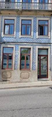a building with blue and white tiles on it at New Life - SÉ CATEDRAL STUDIO - 1T in Porto