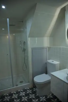 a bathroom with a shower and a toilet and a sink at TOP Porto in Porto