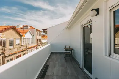 a balcony with a view of the city at Oporto Maison Sol in Porto
