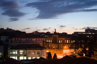 a view of a city skyline at night at Apartments Porto Historico in Porto