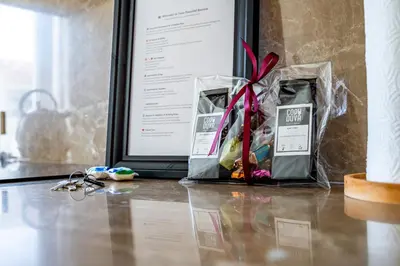 a pair of glasses and some items on a table at L'atelier L - Quartier des Arts in Porto