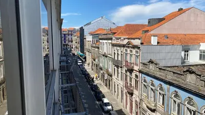 a view from a window of a city street at BEST - Studio Porto Downtown with AC and Parking in Porto