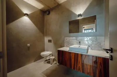 a kitchen and dining room with a wooden table and chairs at City Center Premium Apartment by Vacationy in Porto