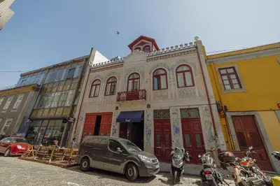 a small car parked in front of a building at Elegant Downtown Apartment by Vacationy in Porto