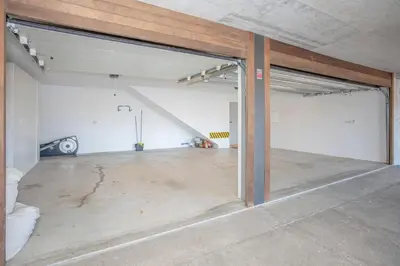 an empty garage with a large concrete floor at Liiiving in Gaia - Douro Dream View in Vila Nova de Gaia