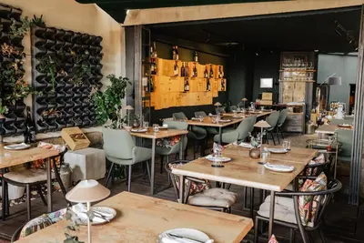 a living room with a couch and a lamp at ALIBI by YoursPorto in Porto