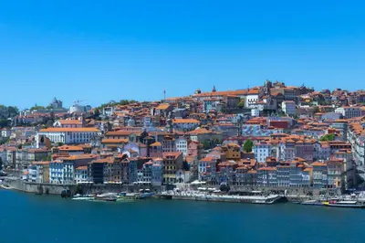 a city on the shore of a body of water at 180º Porto River View in Vila Nova de Gaia