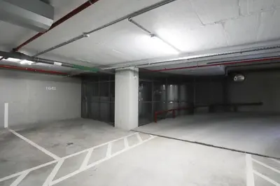 an empty parking garage with a large room at HM - Casa Ghiselini Porto 213 in Porto