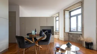 a living room with a couch and a table at Authentic Porto House in Porto