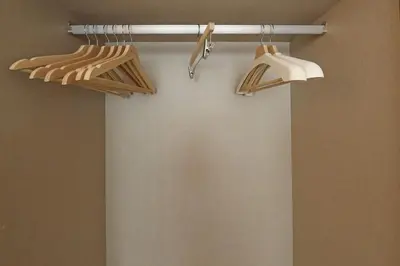 a room with wooden hangers on a wall at Music Apartment I in Porto