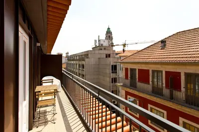 a balcony with a view of a building at BOUTIQUE Rentals-THE ALMA Apt w/ balcony in Porto