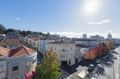 an aerial view of a city with buildings at Travel and Live Faria Guimarães in Porto
