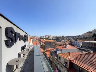 a view of a city from the roof of a building at Smartr Porto Gaia & Spa in Vila Nova de Gaia