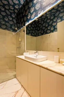 a bathroom with a sink and a mirror at BOUTIQUE Rentals-Isabella Ribeira Apt great views in Porto