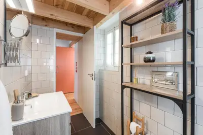 a bathroom with a sink and a mirror at OPO Bonjardim 902 I in Porto
