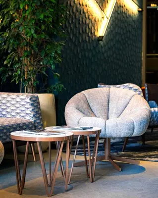 a bar in a store with a table in front of it at Axis Porto Club Aliados in Porto