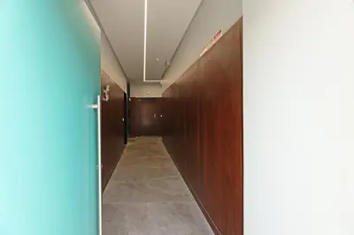 a corridor in an office building with wooden walls at FLH Gaia Homey Winery Flat in Vila Nova de Gaia