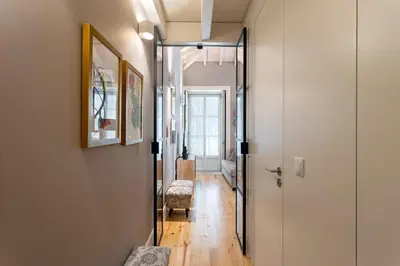 a hallway with a door leading into a room at Lemon Mezzanine - Santa Catarina in Porto