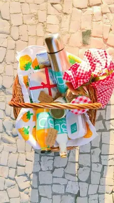 a basket full of food and drinks on a street at Lemon Mezzanine - Santa Catarina in Porto