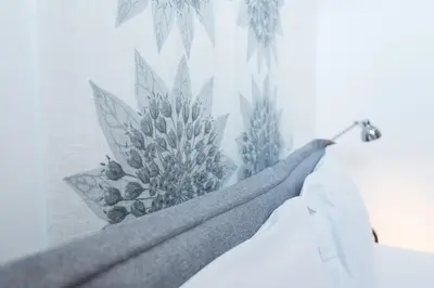 a curtain with a pineapple pattern on a wall at Dream Views of Porto - Private Apt in Gaia by Lisbeyond in Vila Nova de Gaia