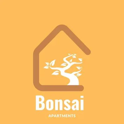 a sign for a bonsai garden with a tree in a house at Bonsai Apartment IIII in Porto