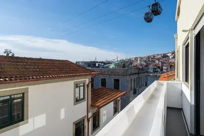 a view from the balcony of a building at Magnificent Sunny Flat - Douro River in Vila Nova de Gaia