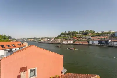 a view of a river with boats in it at MY DOURO VIEW Stylish Gem River Front in Massarelos