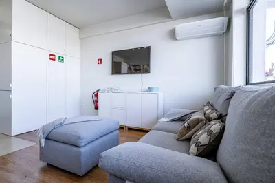 a bathroom with a shower and a sink at Downtown Private Rooftop Experience in Porto