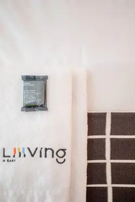 a towel with the word wine written on it at Liiiving in Porto - Garden Light Mezzanine in Porto