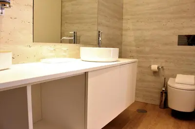 a bathroom with a sink and a toilet at Oporto Prime Studios in Porto