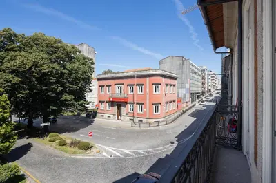 a view of a street from a balcony of a building at CASA JOY Santa Catarina apartment in Porto