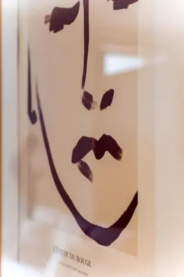a picture of a man with a mustache in a glass case at Dom João Premium Apartment by DA'HOME in Porto