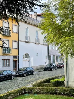 a group of cars parked in front of a building at LovePorto2 Balcony/Garden@Hist.C in Porto
