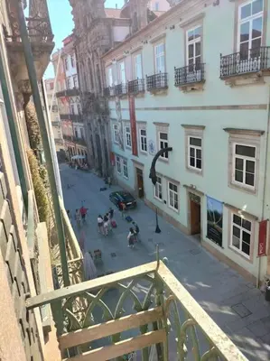 a view of a street in a city with buildings at Flores Apartment in Porto