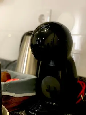a black blender sitting on top of a counter at Almada Downtown 204 in Porto
