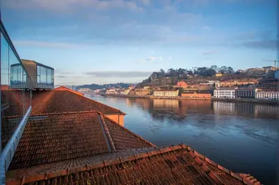 a view of a river with houses and buildings at MY DOURO VIEW Stunning Apartment River Front in Vila Nova de Gaia