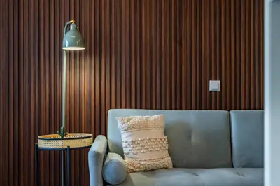 a bathroom with a washing machine and a toilet at Plan C Downtown Apartment in Porto
