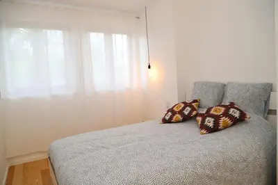 a bedroom with a bed with two pillows on it at Casa do Pilar - D. Luís I in Vila Nova de Gaia
