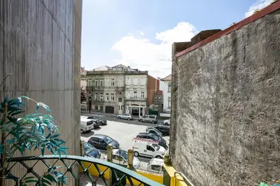 a view of a parking lot from a balcony at Valentino Loft Porto Center - by Guest SPA in Porto