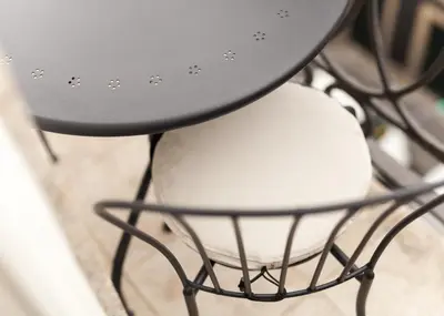 a black and white chair with a white seat at VIVA Merchant's Way in Porto