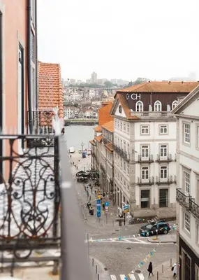 a view of a city from a balcony of a building at VIVA Merchant's Way in Porto