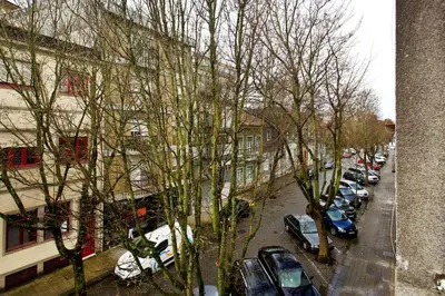 a group of cars parked in a parking lot at APOSENTUS - Serenity 1D in Porto