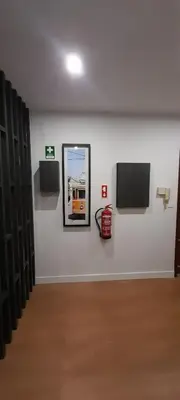 a mirror on a wall in a room at 504 New Apartment Galé in Porto