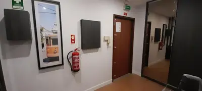 a room with a fire hydrant on a wall at 504 New Apartment Galé in Porto