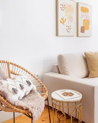 a living room with a couch and a chair at República Garden View in Porto